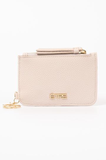 mia-card-holder-nude-pebbled-faux-leather-front-view-gold-etre-logo-two-clip-on-attachments