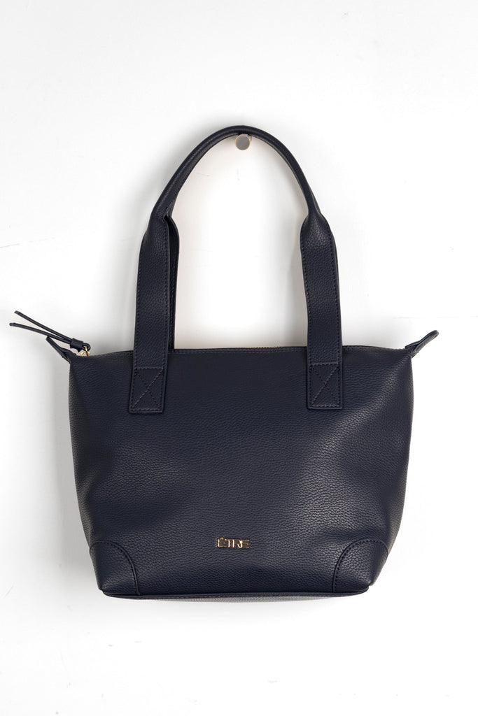 plain navy blue faux leather medium sized tote bag with gold hardware