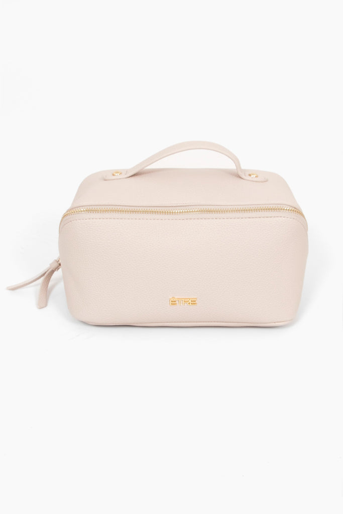 mila-vanity-case-nude-pebbled-faux-leather-front-view-top-carry-handle