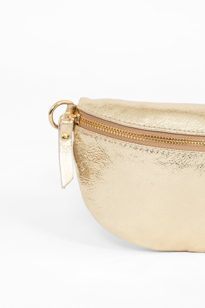 metallic gold leather half moon bag with detachable strap