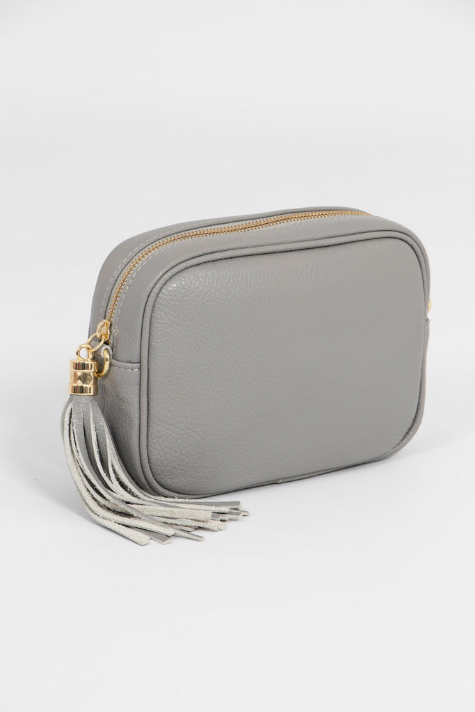 light grey crossbody leather bag with matching detachable bag strap