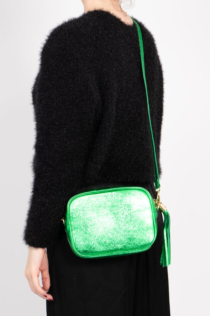 beau-italian-leather-crossbody-bag-bright-green-metallic-worn-by-model