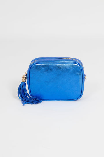 metallic blue leather crossbody camera bag with matching detachable bag strap