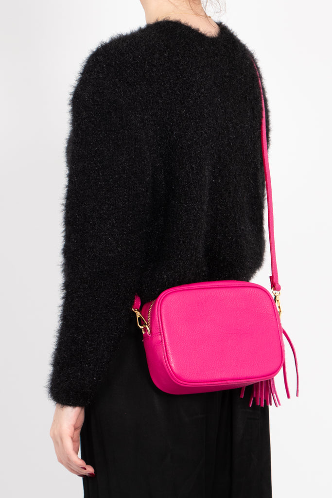beau-italian-leather-crossbody-bag-raspberry-pebbled-worn-by-model