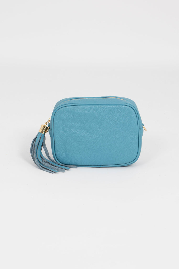 sky blue leather crossbody bag with matching detachable bag strap