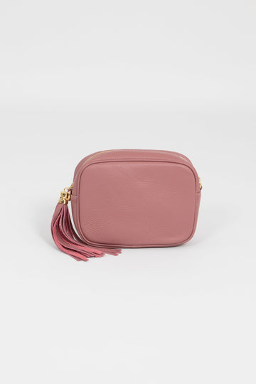 dusty dark pink leather crossbody bag with matching detachable bag strap