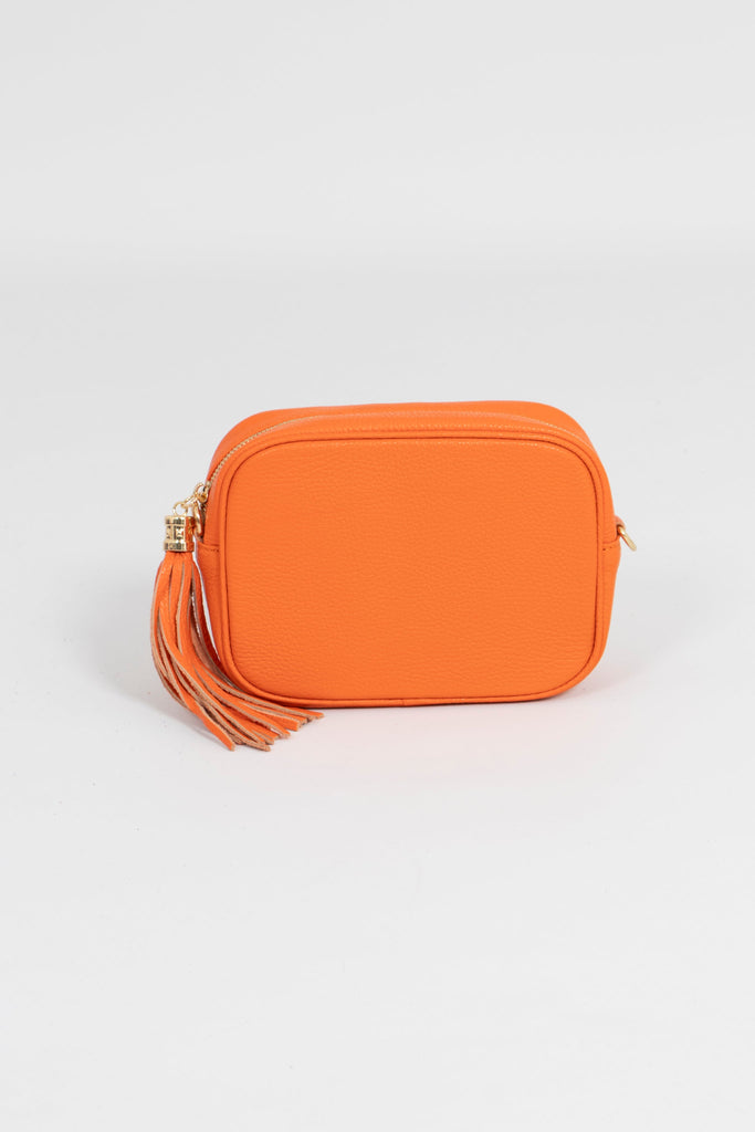 orange crossbody leather bag with matching detachable bag strap