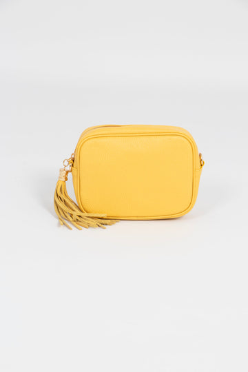 bright yellow pebbled leather crossbody camera bag with detachable bag strap