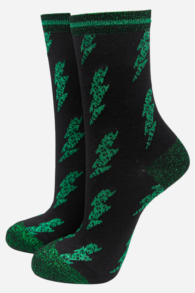 black socks with green lightning bolts and green sparkly glitter accents 