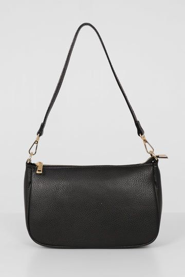 black leather baguetter bag with detachable strap and zip closure