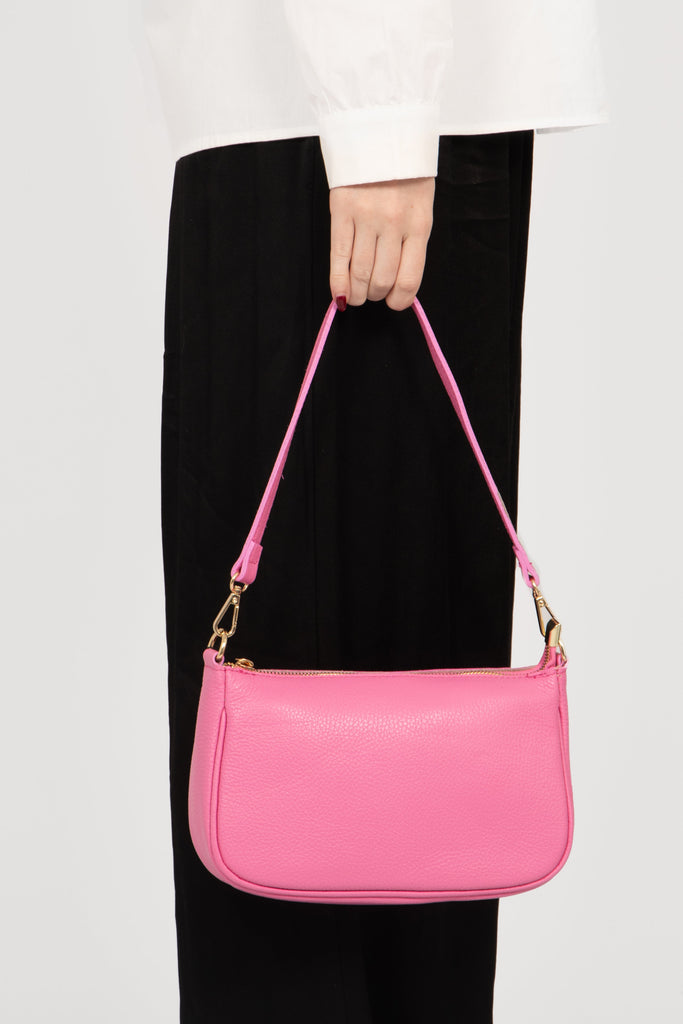 chloe-italian-leather-baguette-bag-hot-pink-pebbled-held-by-model