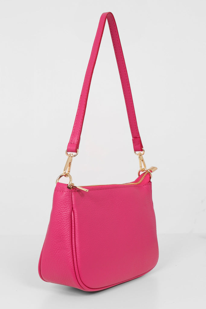 pink baguette clutch bag with detachable bag strap