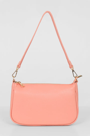 salmon pink leather baguette clutch bag with zip closure