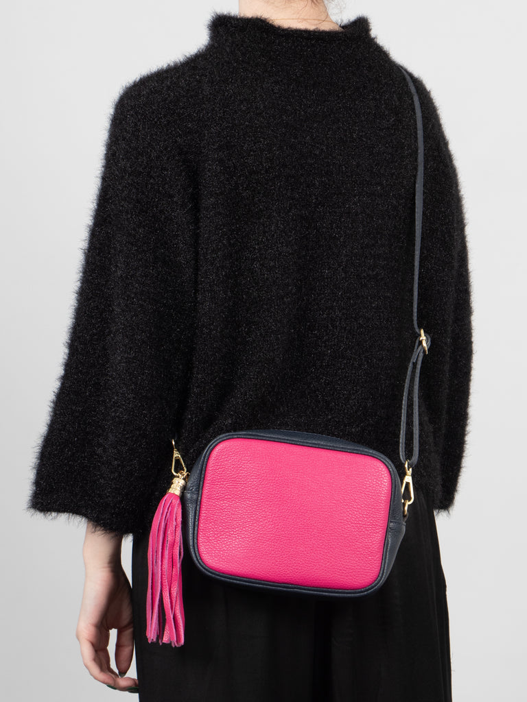 beau-italian-leather-crossbody-bag-fuchsia-navy-blue-pebbled-worn-by-model