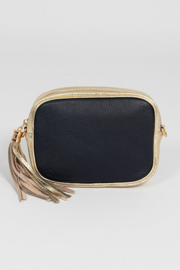 navy blue and gold leather crossbody camera bag with gold detachable bag strap