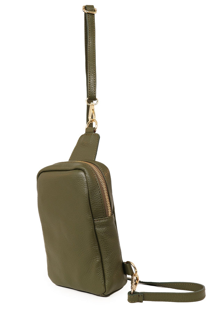 side view of khaki green sling bag showing zip closure