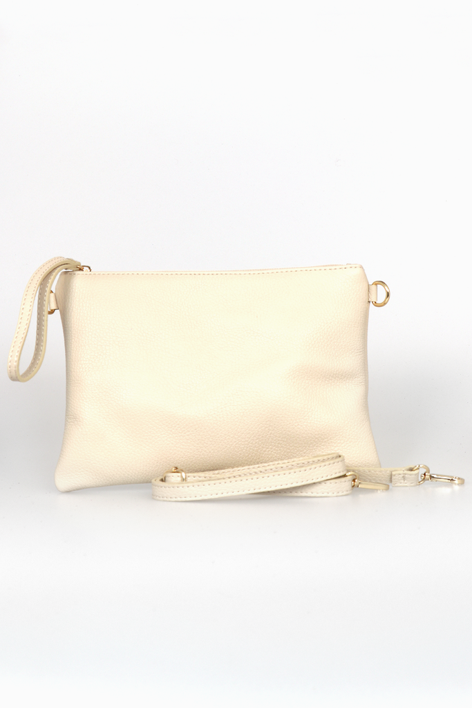 cream coloured wristlet clutch bag made from genuine italian leather