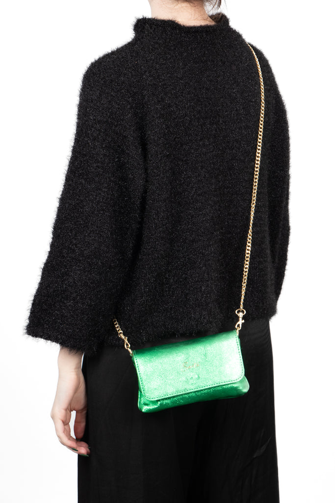olga-metallic-italian-leather-mini-crossbody-bag-bright-green-worn-by-model