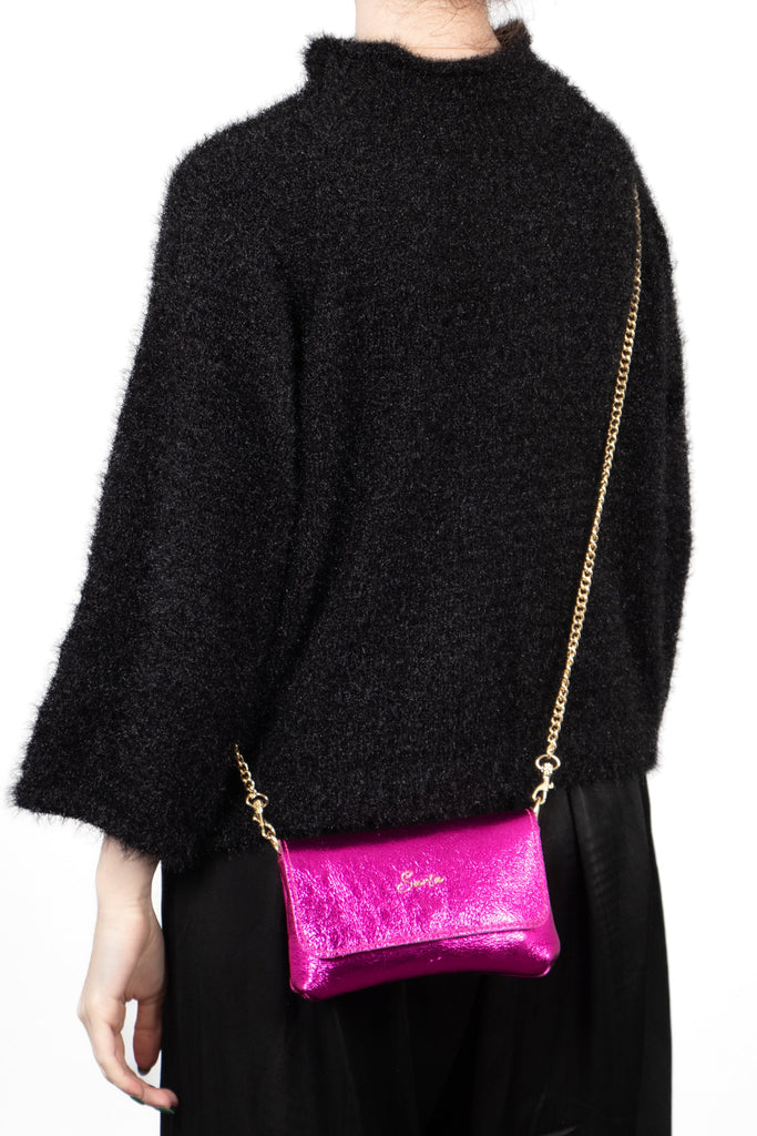 olga-metallic-italian-leather-mini-crossbody-bag-raspberry-worn-by-model