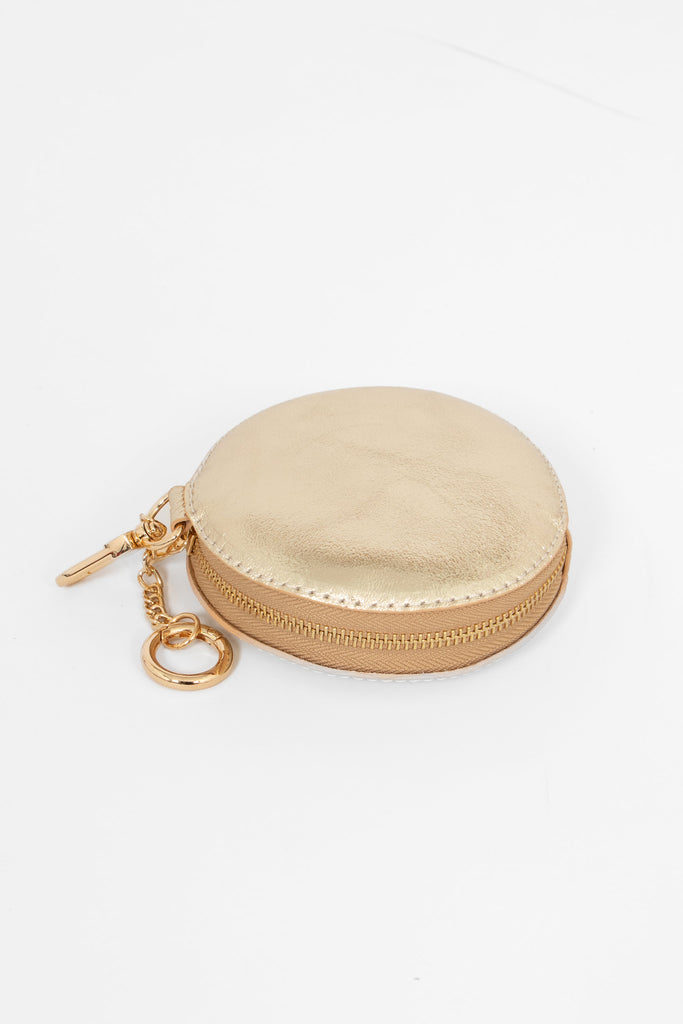 showing the zip closure of the coin purse