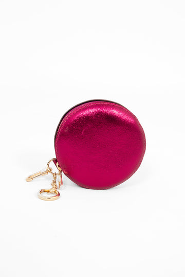 magenta leather round coin purse with zip closure and keyring attachments