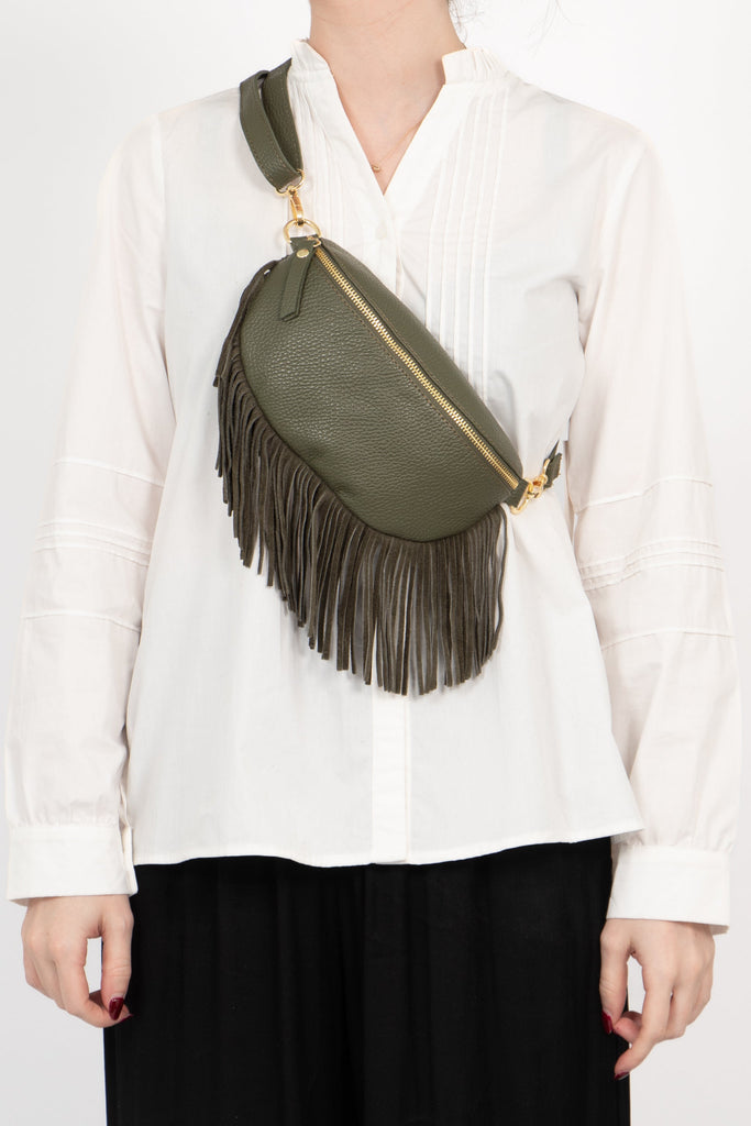 khaki green half moon cross body bag with fringed trim and gold zip closure