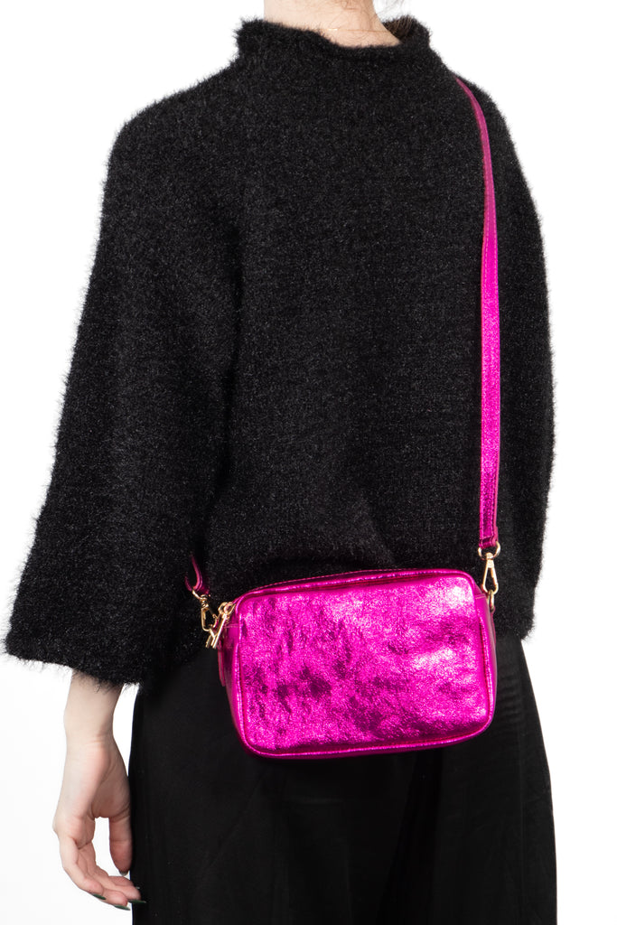 naomi-italian-leather-crossbody-bag-raspberry-metallic-worn-by-model