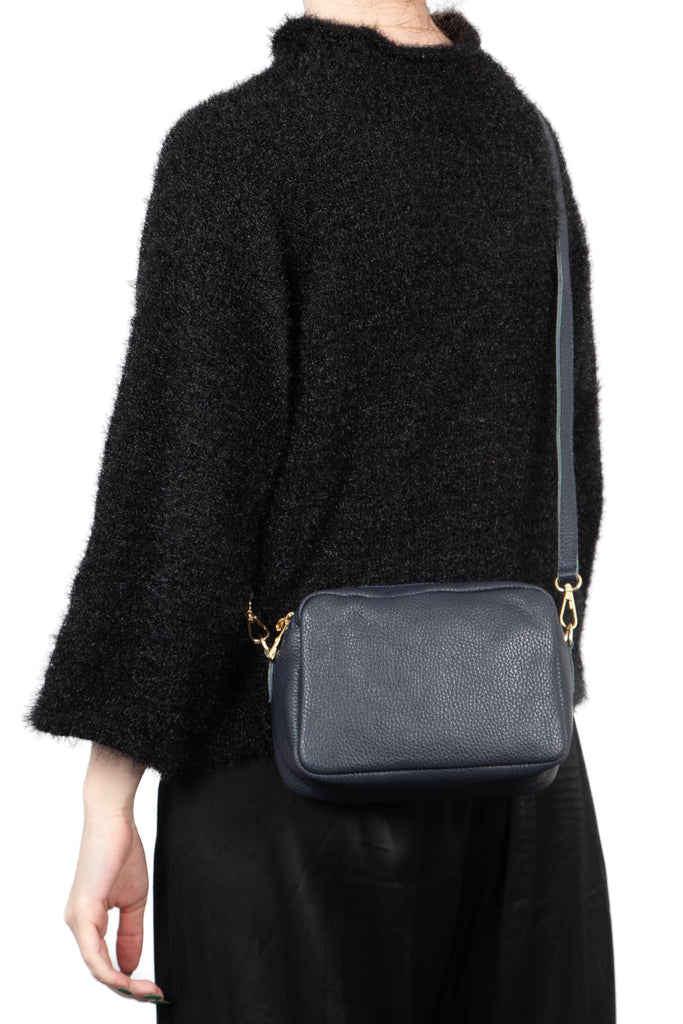 naomi-italian-leather-crossbody-bag-navy-blue-pebbled-worn-by-model