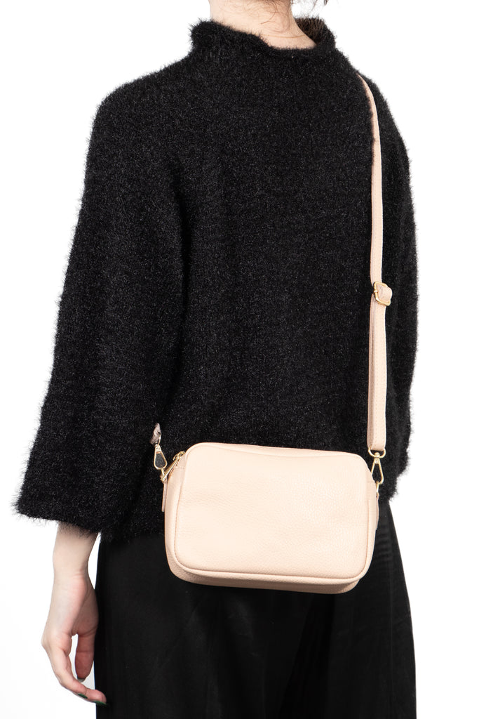 naomi-italian-leather-crossbody-bag-nude-pebbled-worn-by-model