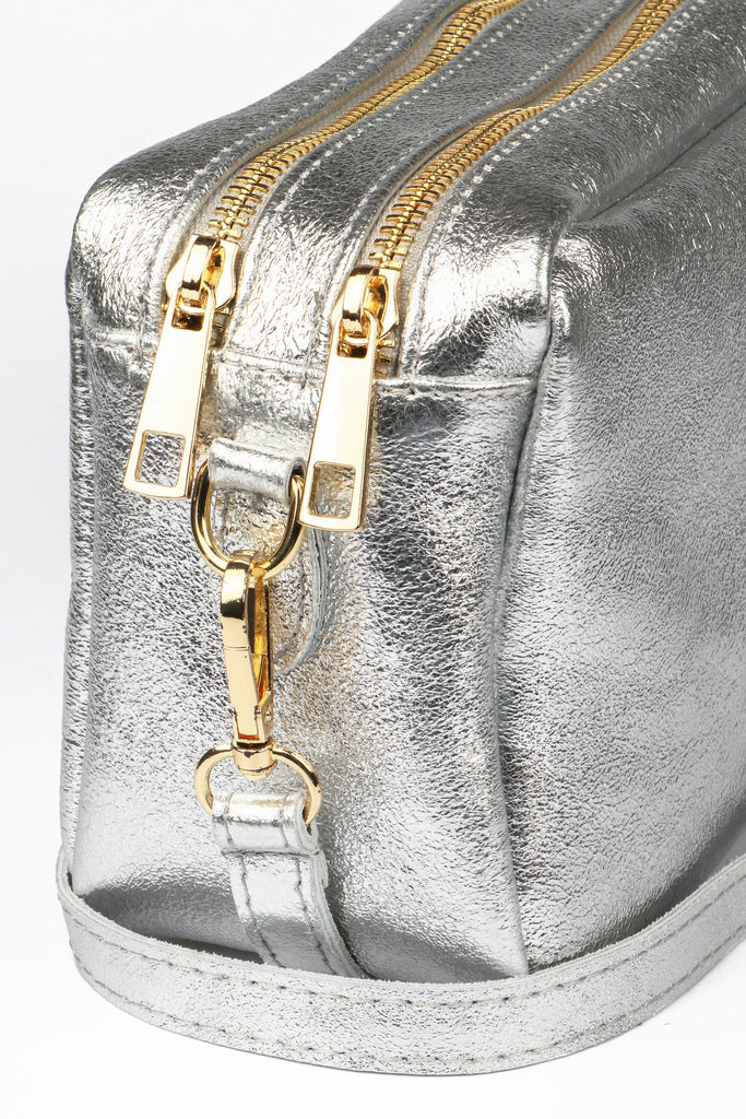 naomi-italian-leather-crossbody-bag-silver-metallic-close-up-zip-compartments