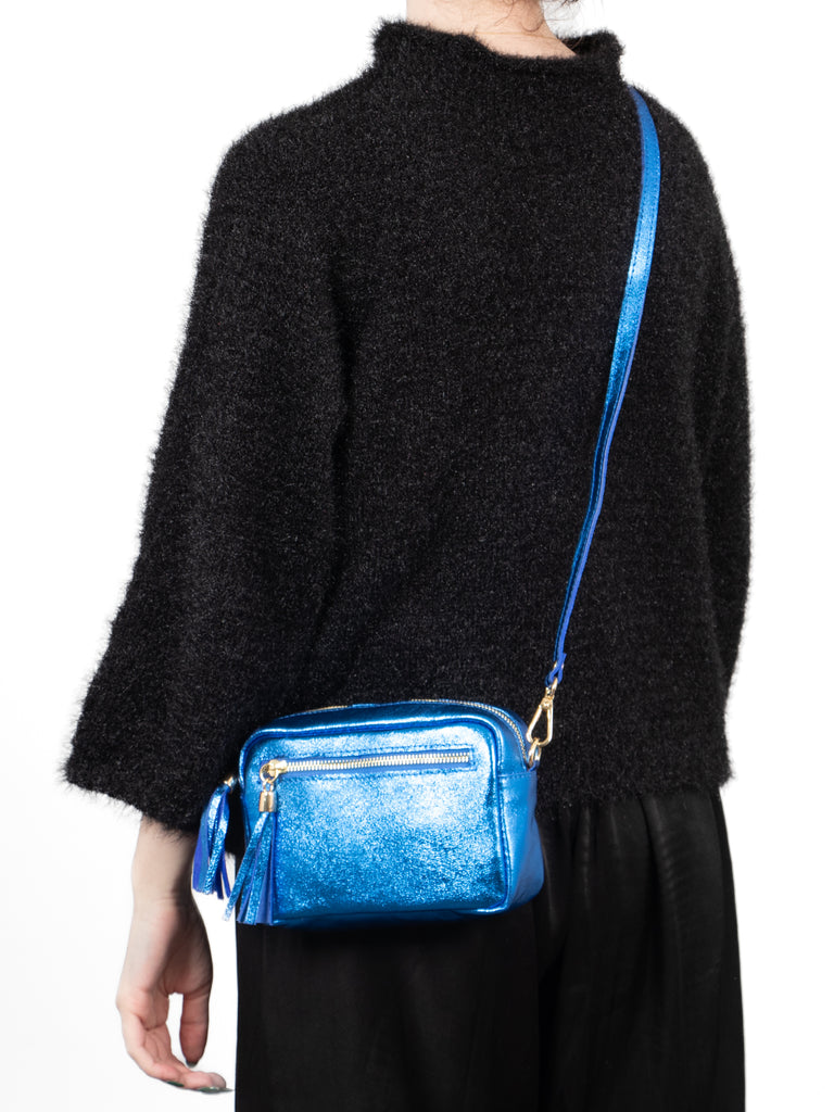 fleur-italian-leather-small-crossbody-bag-blue-metallic-worn-by-model