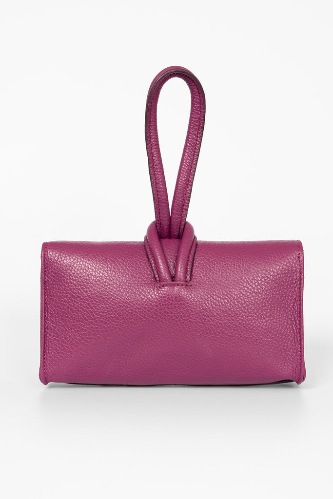 trixie-berry-pebbled-italian-leather-clutch-bag-rear-view-loop-handle-closure