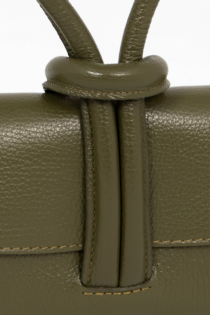 trixie-italian-leather-wristlet-clutch-bag-khaki-pebbled-close-up-knot-wrist-closure