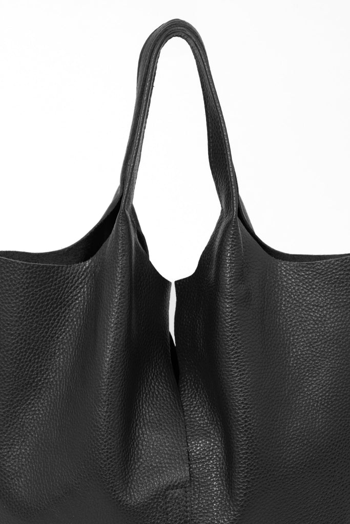 paloma-italian-leather-shoulder-bag-black-pebbled-close-up-top-handles