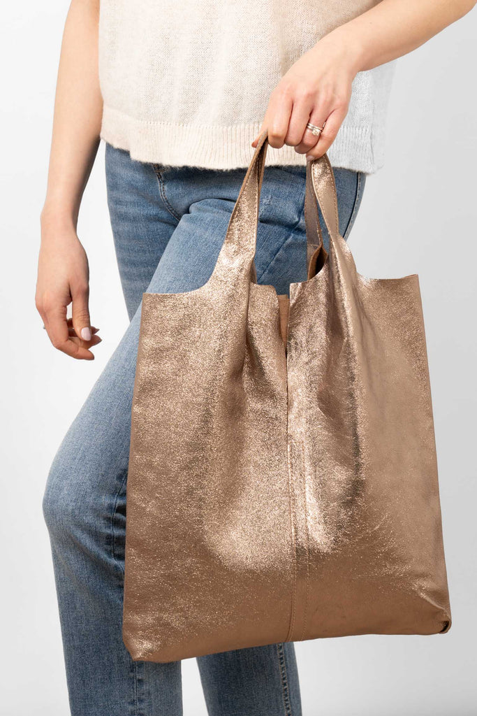 paloma-italian-leather-shoulder-bag-champagne-metallic-held-by-top-handles-model