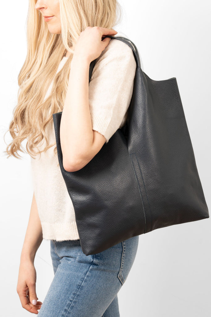 paloma-italian-leather-shoulder-bag-navy-blue-pebbled-model-worn-over-shoulder