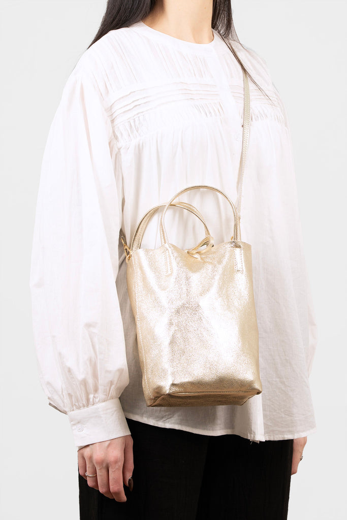 verona-italian-leather-small-tote-bag-gold-metallic-worn-crossbody-model