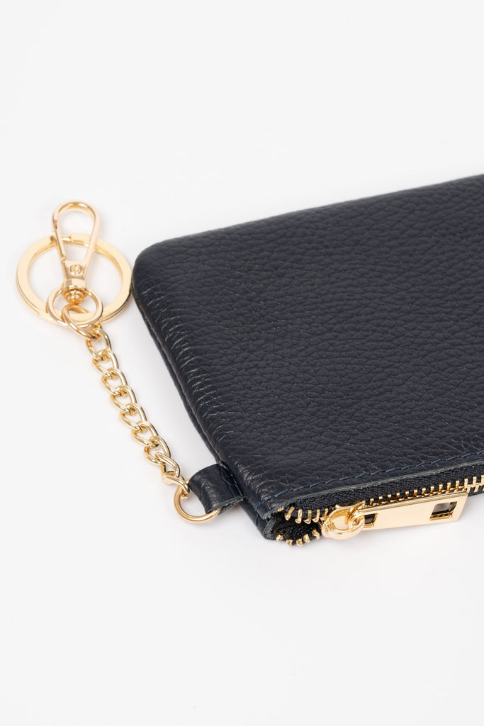 vittoria-italian-leather-small-clip-on-purse-navy-blue-pebbled-close-up-gold-hardware