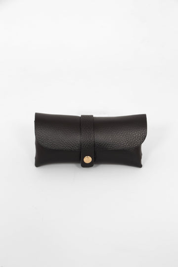 pebbled black leather sunglasses case. the case wraps around the glasses and closes with a front gold button fastening