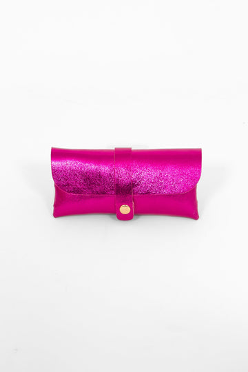 metallic raspberry pink leather sunglasses case. the case wraps around the glasses and closes with a front gold button fastening