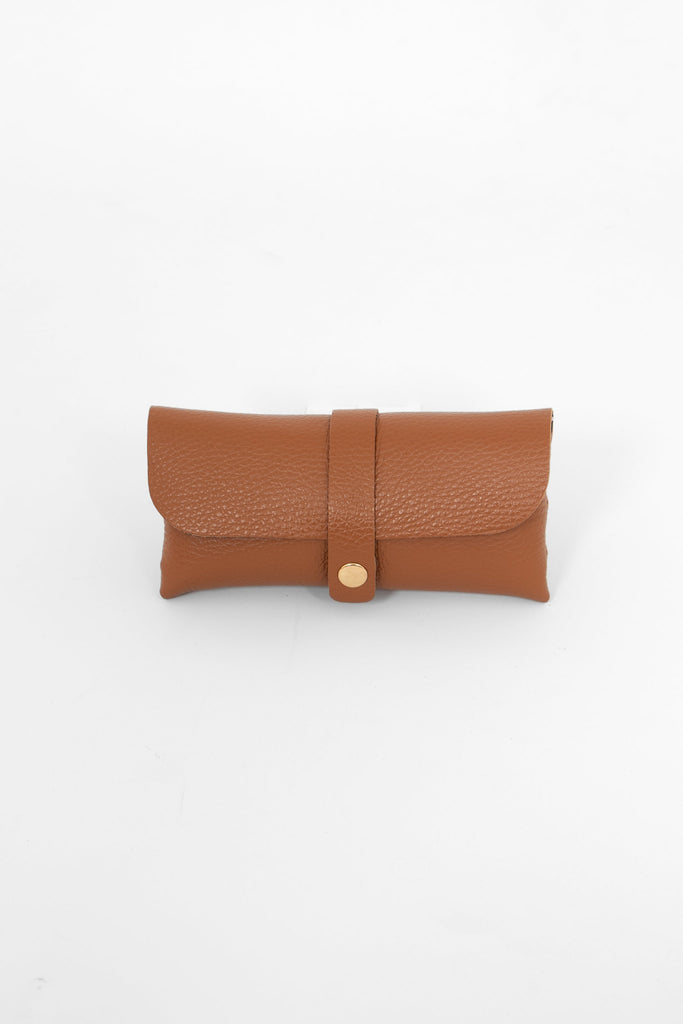 pebbled tan brown leather sunglasses case. the case wraps around the glasses and closes with a front gold button fastening