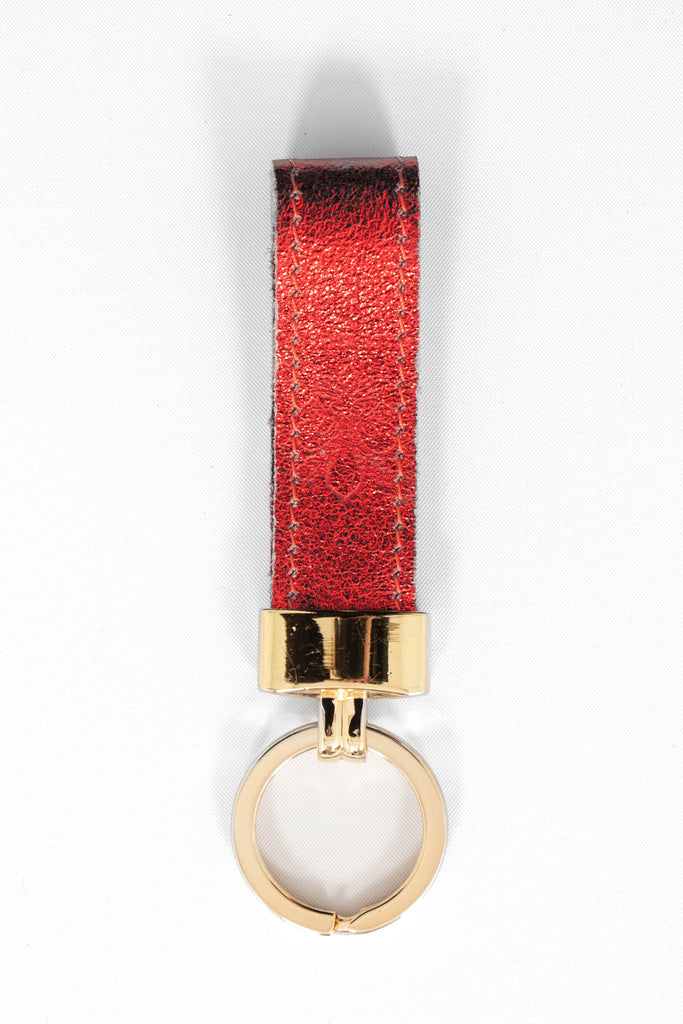 metallic red leather loop keyring with a gold loop attachment. 