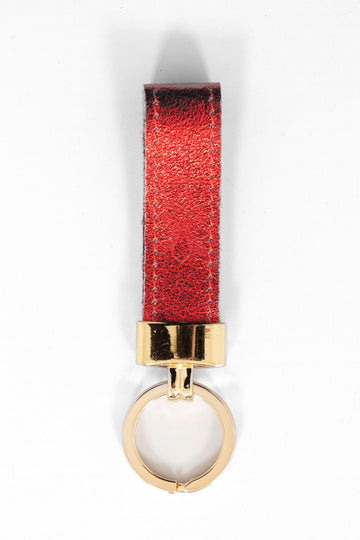 metallic red leather loop keyring with a gold loop attachment. 