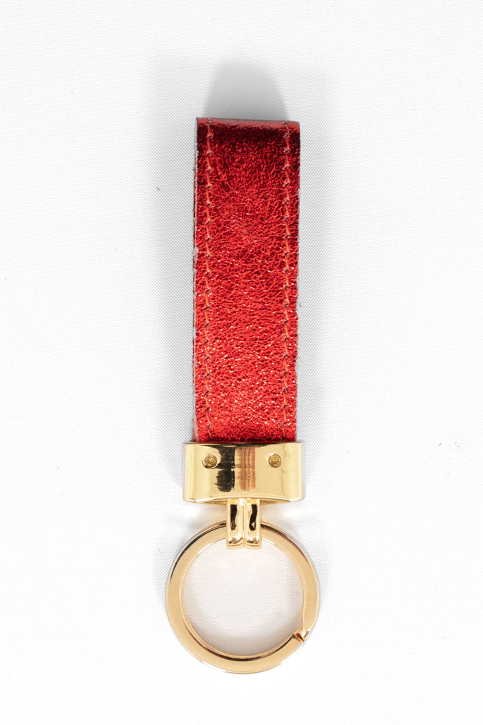 metallic red leather loop keyring with a gold loop attachment. 