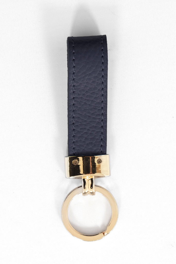 pebbled navy blue leather loop keyring with a gold loop attachment. 