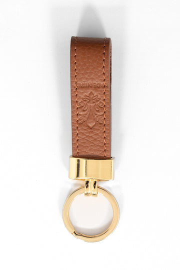 pebbled tan brown leather loop keyring with a gold loop attachment. 