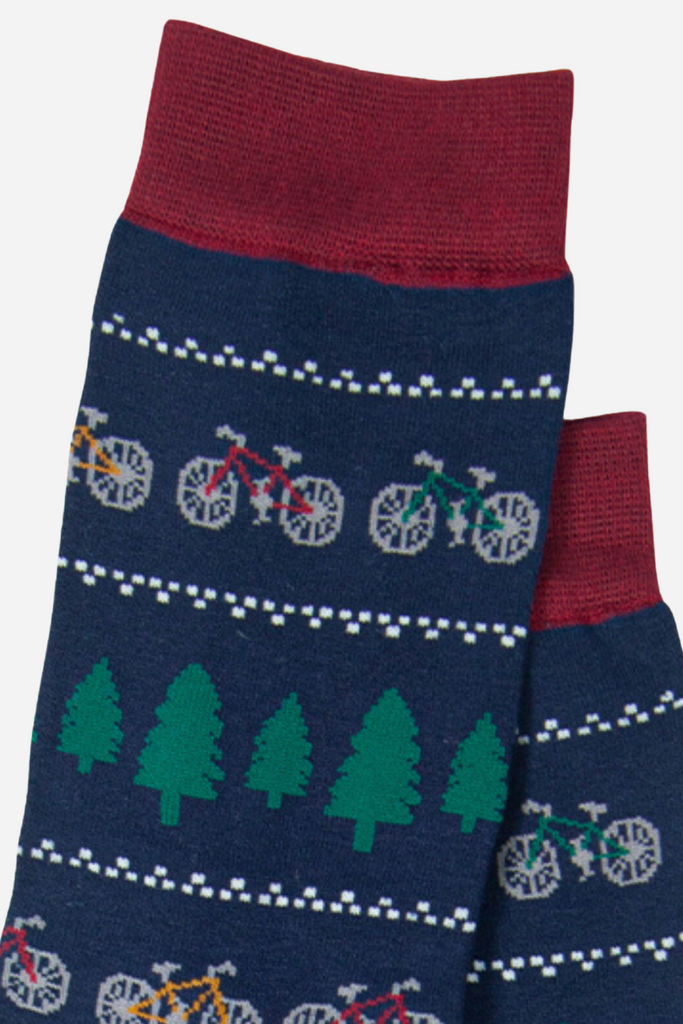 close up of the fair isle style print with trees and bicycles