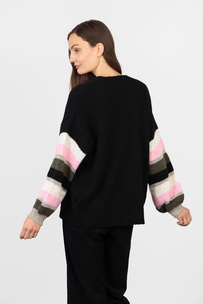 model showing the back of the cardigan which is plain