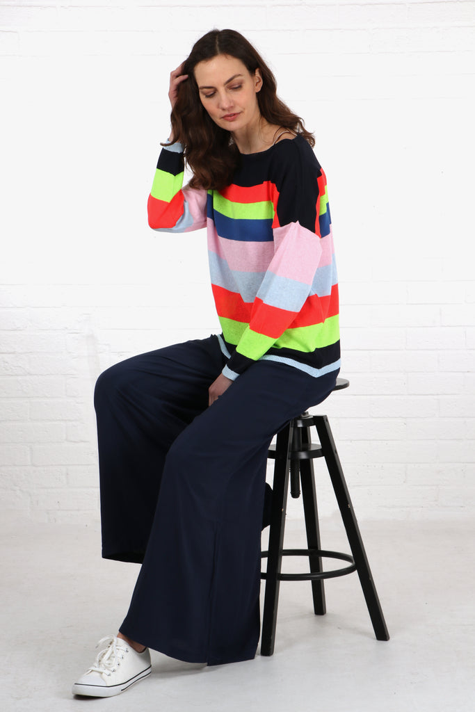 navy blue, orange, green and pink striped multicoloured cotton jumper with long sleeves and a slash neck