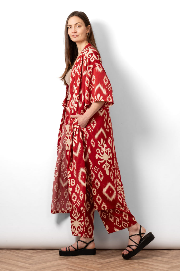 serena-lightweight-long-kimono-red-ikat-side-view-showing-3/4-length-sleeves